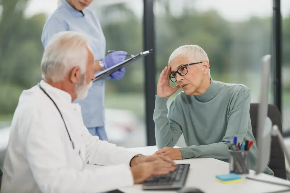 Doctor with patient (stock photo)
